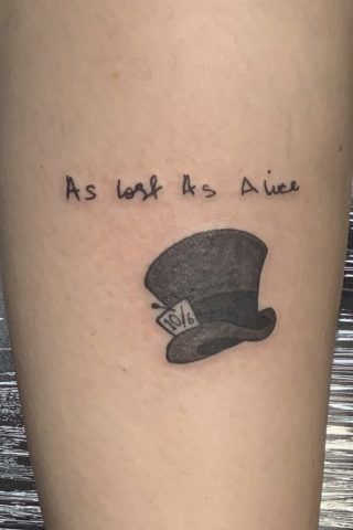 Alice in Wonderland tattoo by Chris McGuire
