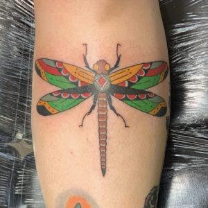 Dragonfly tattoo by Chris McGuire