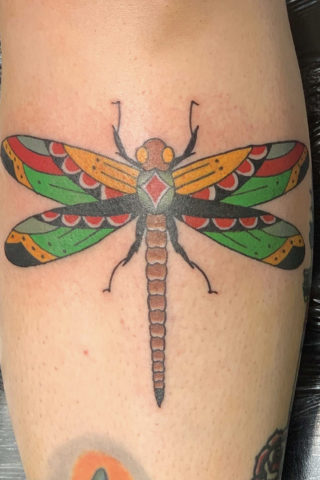 Dragonfly tattoo by Chris McGuire