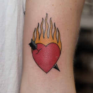 Heart and flames tattoo by Chris McGuire