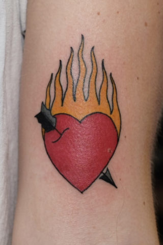 Heart and flames tattoo by Chris McGuire