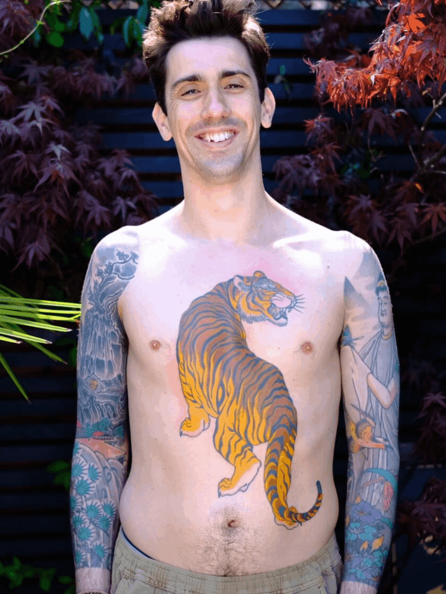 large chest tiger tattoo on ribs at Storyville Tattoo Studio London